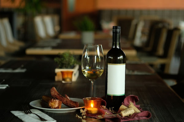 Wine and bottle on restaurant table